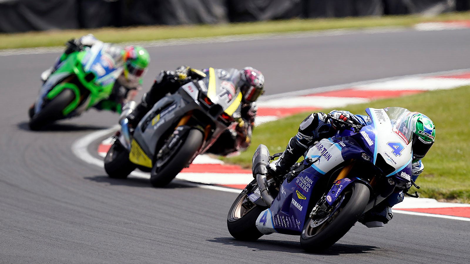 Jack Kennedy leads Storm Stacey, Max Cook, 2023 Donington Park GP BSB. - Mar-Train Racing